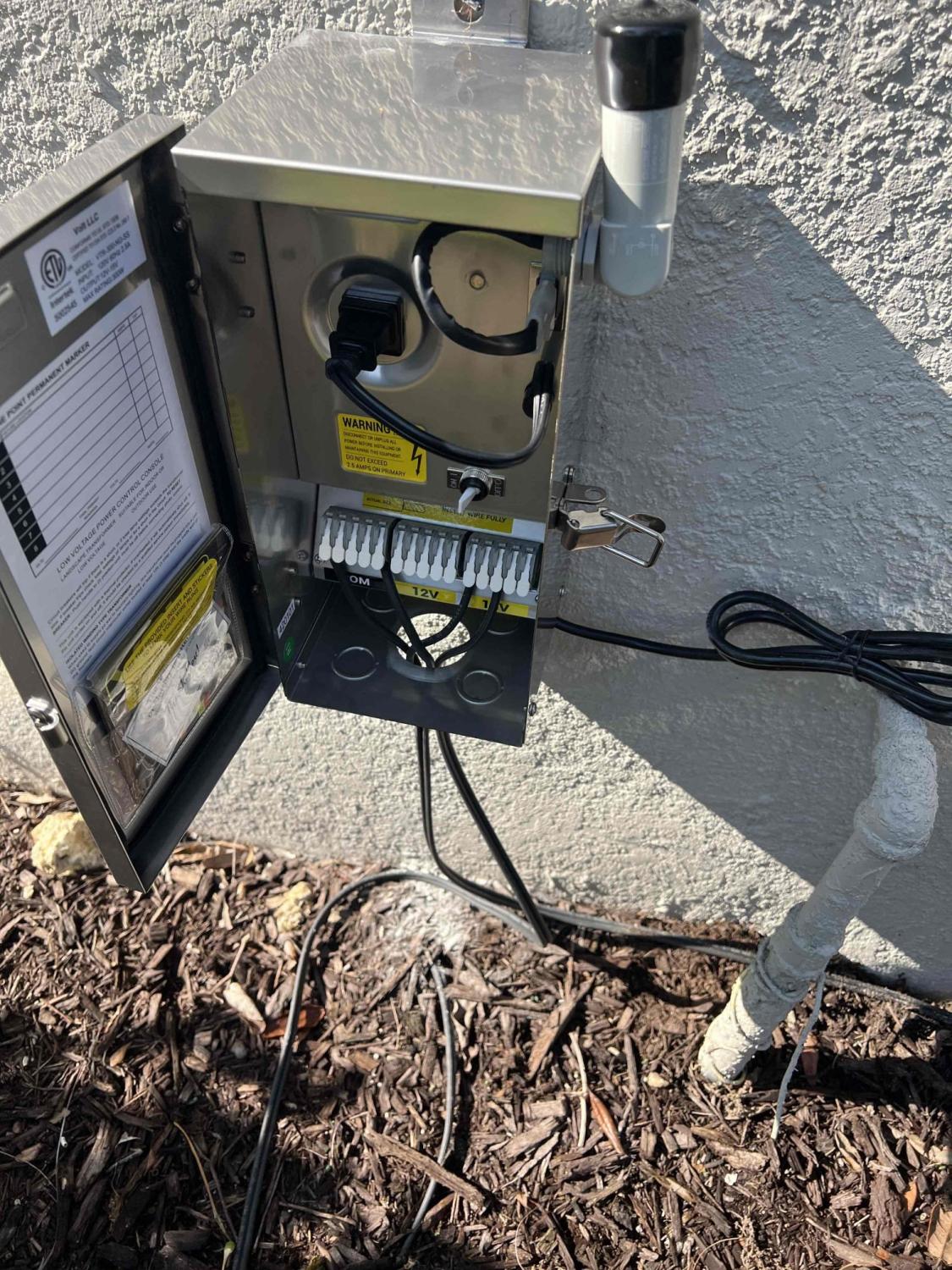 Naples electrician Naples FL electrician outdoor lighting control photocell lighting 300W transformer installation low voltage lighting Naples 300W Low Voltage Transformer with Photocell Installed – Naples, FL